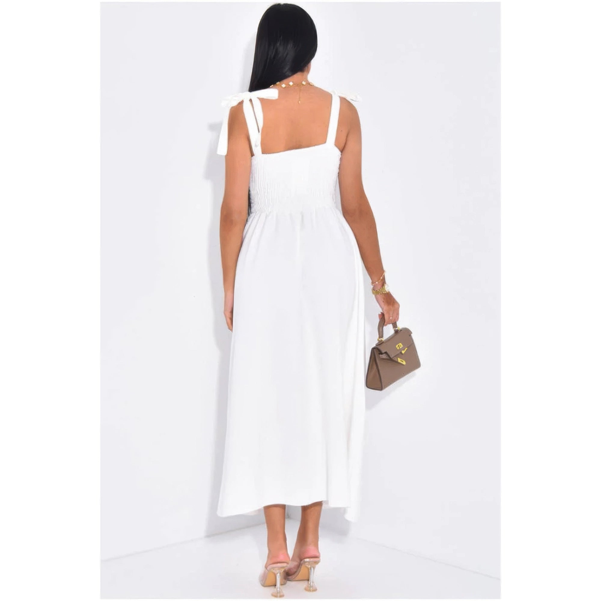 White corset dress dress with adjustable shoulder ties, perfect for summer outings