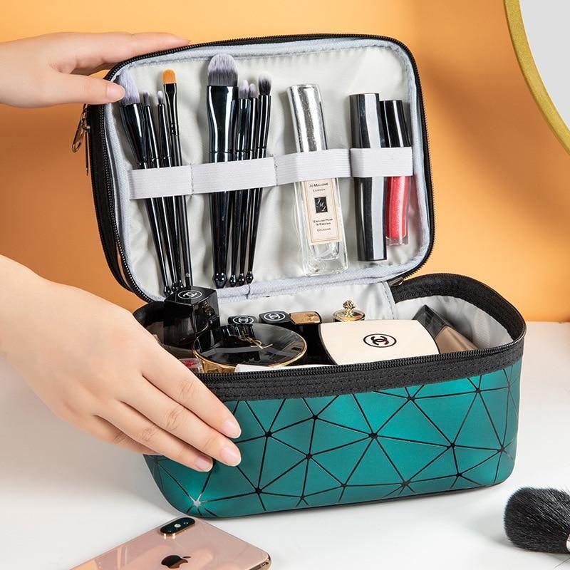 VacationGrabs multi compartment cosmetic bag in teal with organized makeup brushes and toiletries