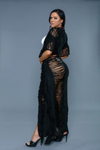 Women's black swim cover-up, sheer fabric, perfect for beach days