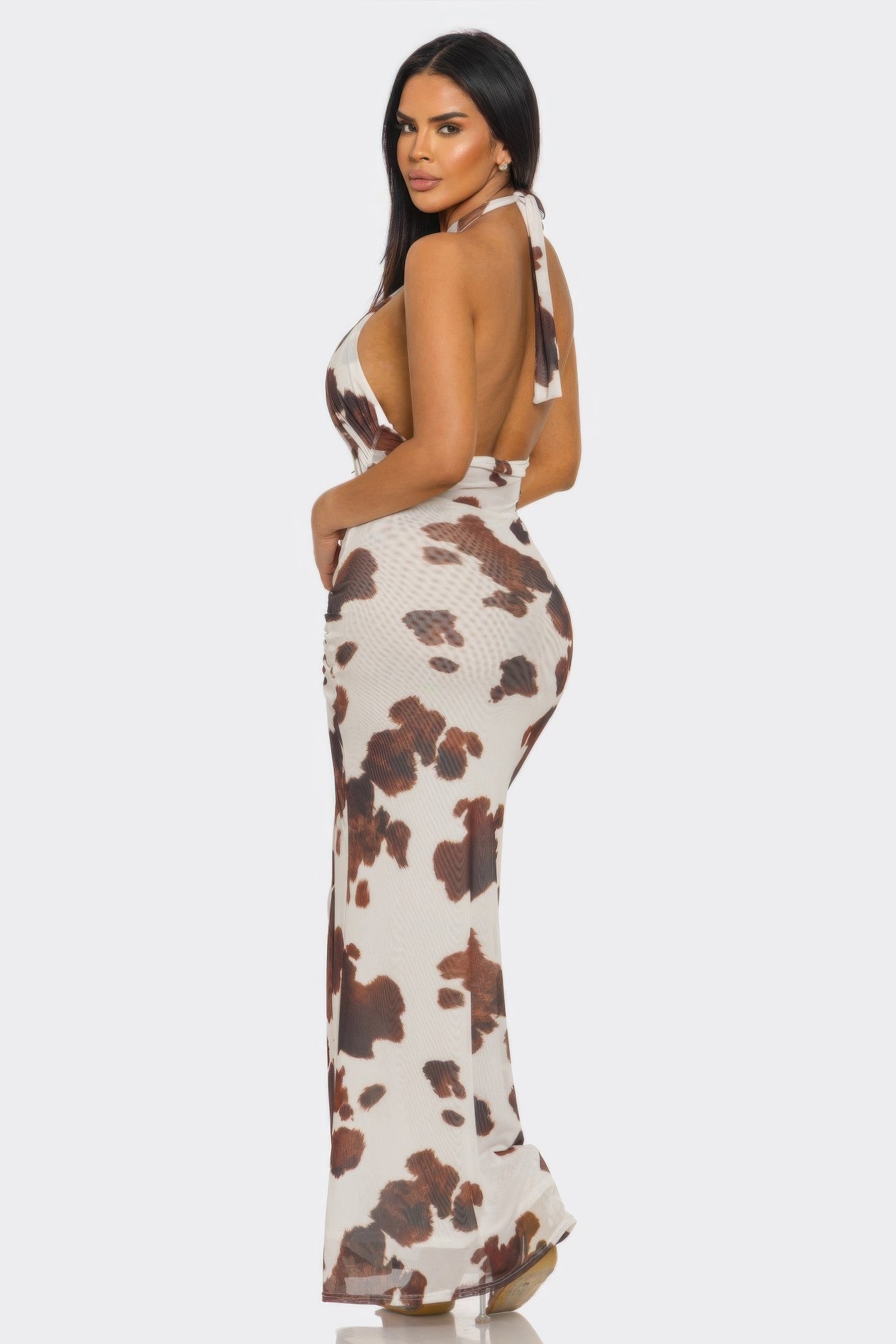 Women's halter back maxi dress in brown cow print for summer events