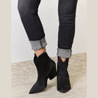 Women's black cowboy boots with sparkling embellishments for stylish wear