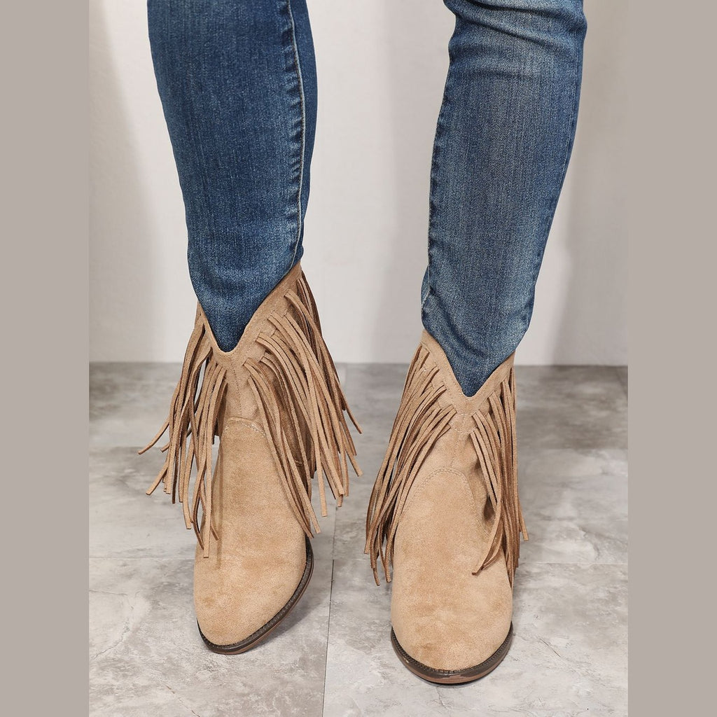 Women's beige cowboy boots with fringe detail for stylish outfits