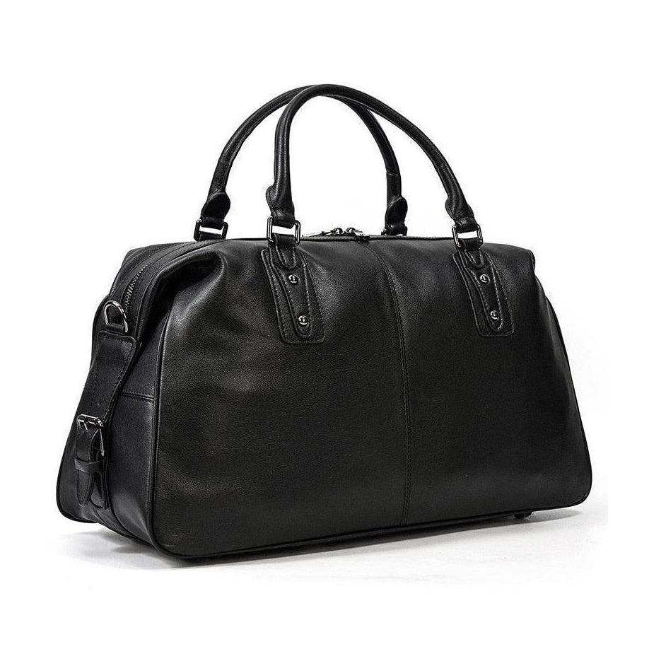 Stylish black cowskin leather travel bag with durable handles and spacious interior