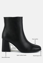 Bottines Chelsea à talons blocs et découpes Cox