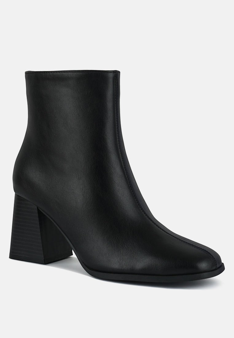 Bottines Chelsea à talons blocs et découpes Cox