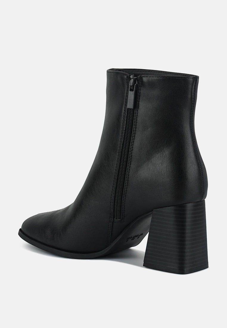 Bottines Chelsea à talons blocs et découpes Cox