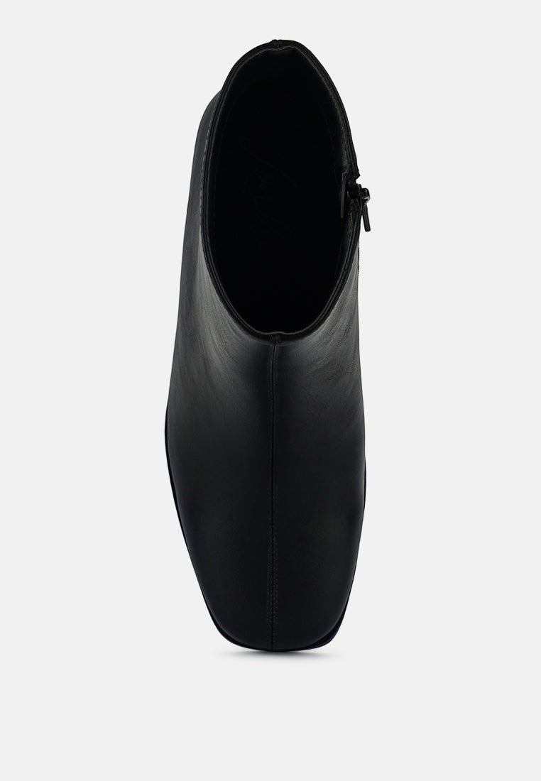Bottines Chelsea à talons blocs et découpes Cox