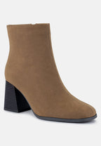 Bottines Chelsea à talons blocs et découpes Cox