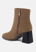 Bottines Chelsea à talons blocs et découpes Cox