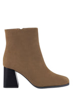 Bottines Chelsea à talons blocs et découpes Cox