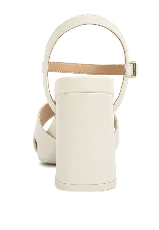 Women's beige criss cross block heel sandals for stylish occasions