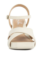 Women's criss cross block heel sandals in light beige, perfect for summer outings