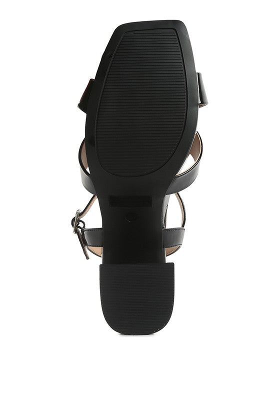 Women's black criss cross block heel sandals for stylish outings