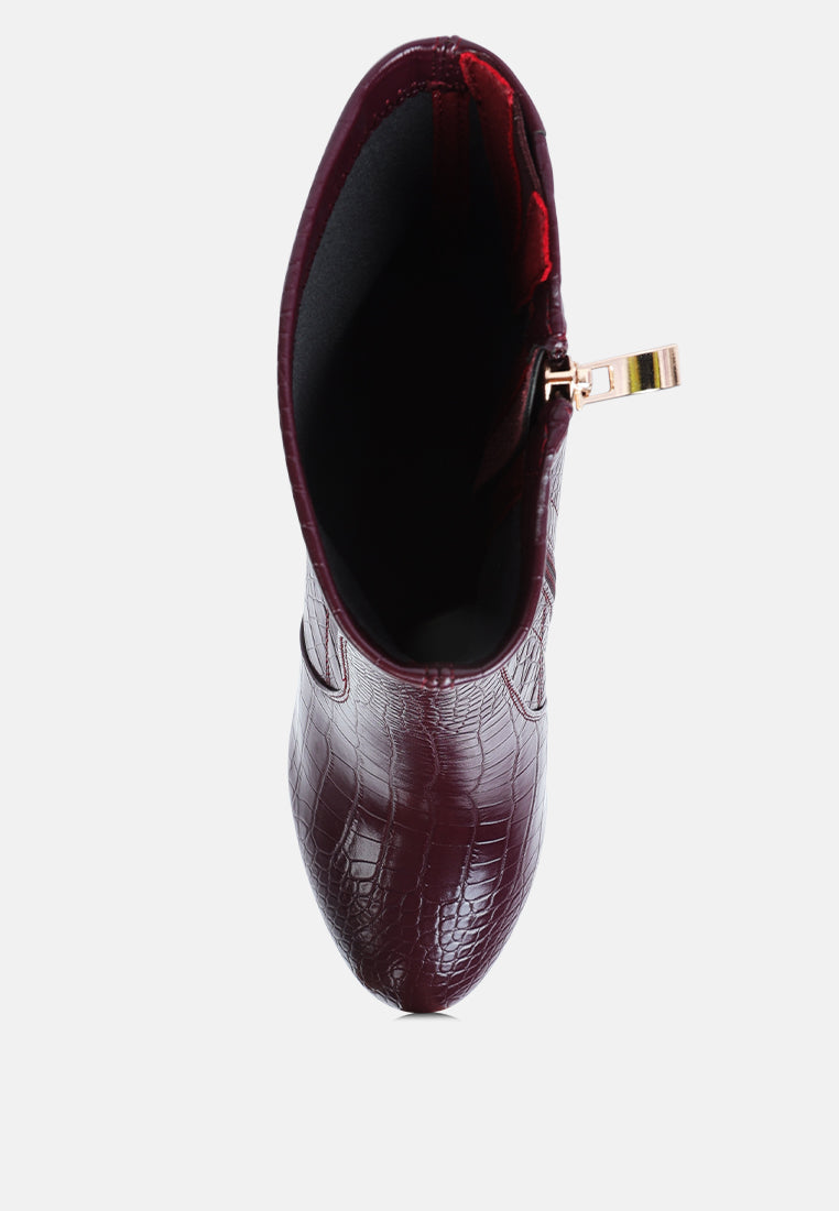 Burgundy croc pattern ankle boots with a sleek design and side zipper for easy wear