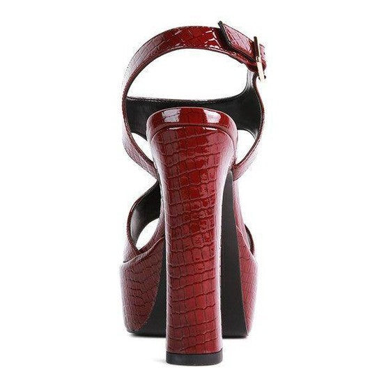 Red croc textured high heels with a stylish ankle strap and chunky platform sole