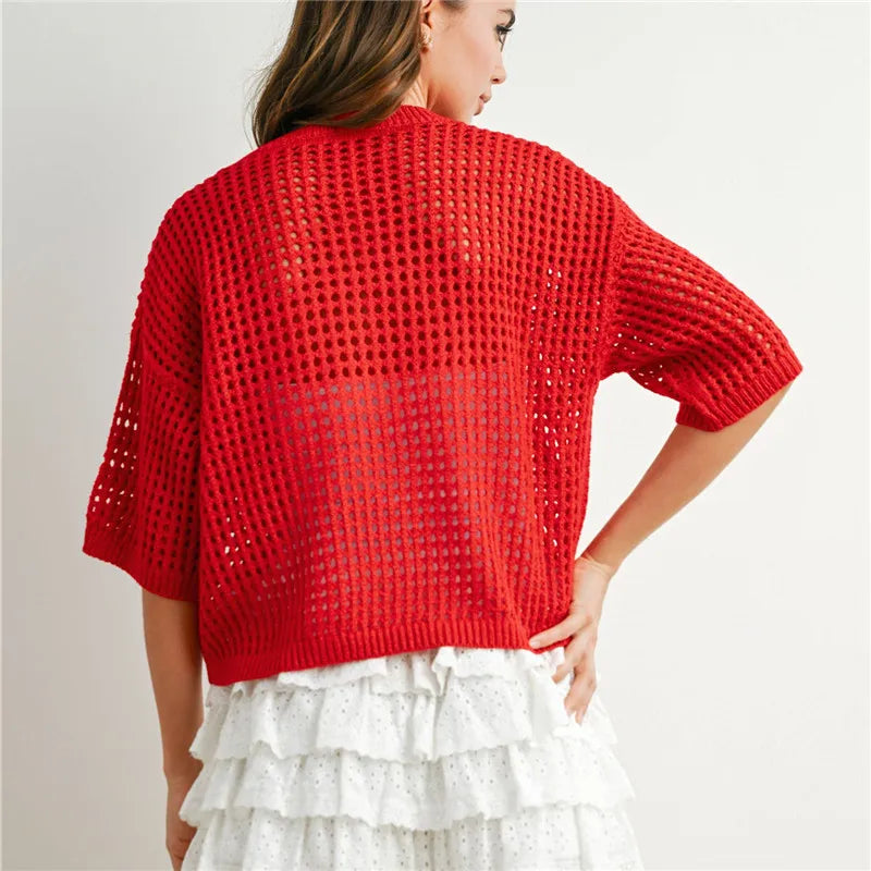 Red open-knit crochet sweater pattern for crochet sweater enthusiasts