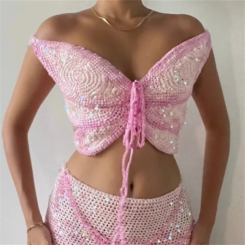 Pink crochet top crop with shimmering details, perfect for summer outings