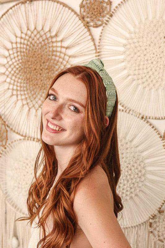 Leto Accessories crochet trim fashion headband in green worn by a woman with long red hair