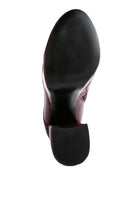 Bottom view of Rag Company crocodile pattern platform boots showcasing rubber sole for stability