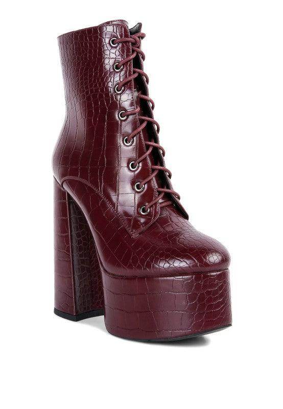 Burgundy crocodile pattern platform boots with high block heel and lace-up design from Rag Company