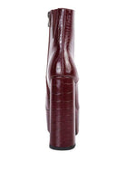 Burgundy crocodile pattern platform boots with a stylish high heel and zip closure from Rag Company