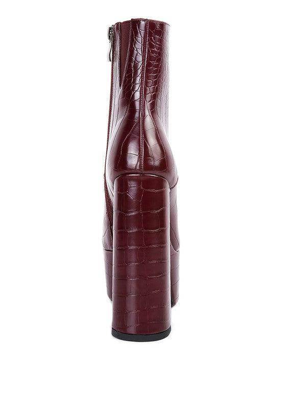Burgundy crocodile pattern platform boots with a stylish high heel and zip closure from Rag Company