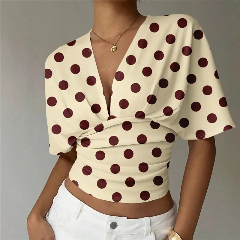 Beige crop top with maroon polka dots, perfect for summer outings