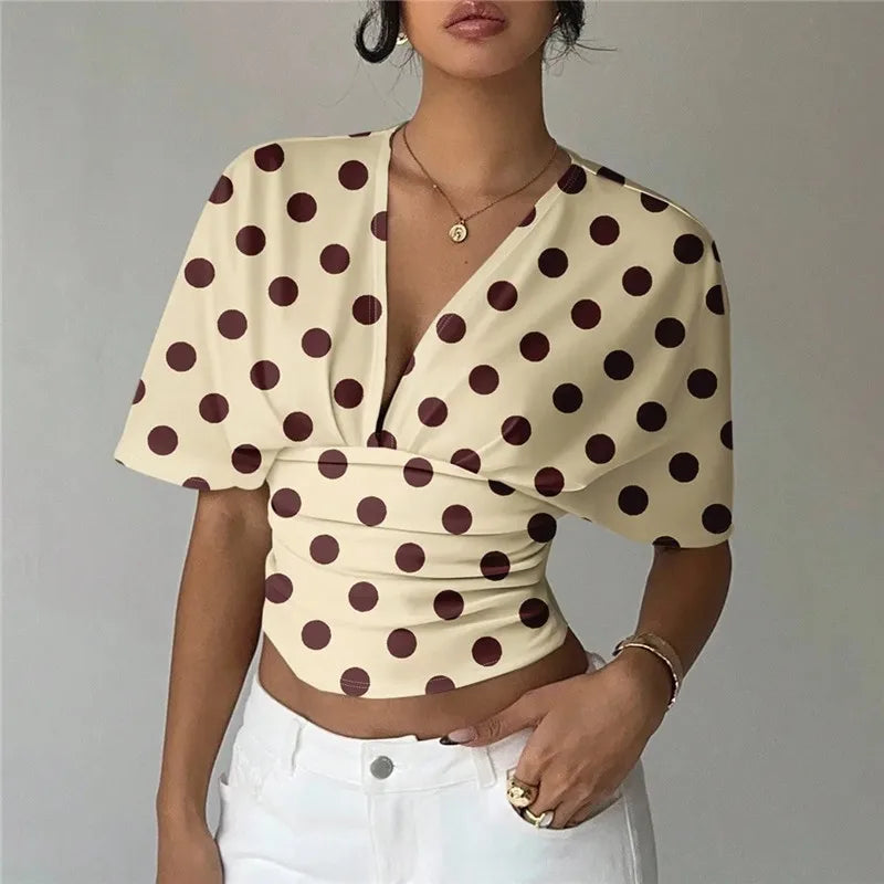 Women's cream polka dot crop top, stylish for casual outings