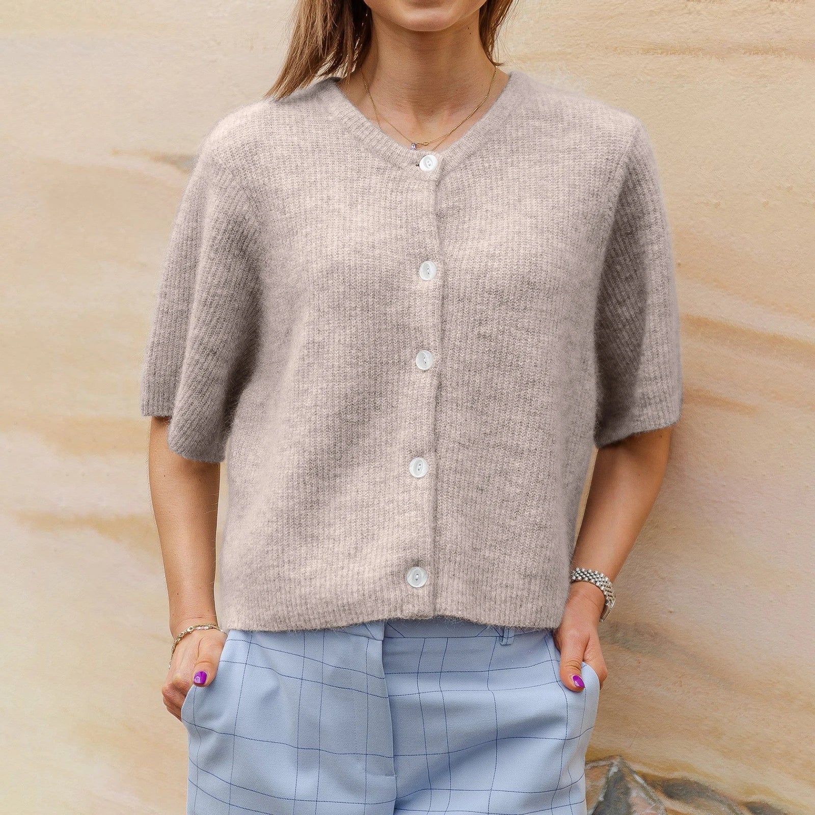Women's beige crop top in soft knit for casual outings