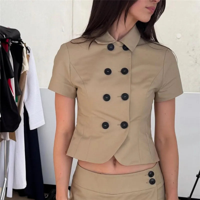 Women's beige crop top with button detail, stylish for casual outings