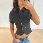 Women's black crop top in a fitted design, perfect for casual outings