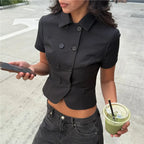 Women's black crop top in fitted design, perfect for casual outings