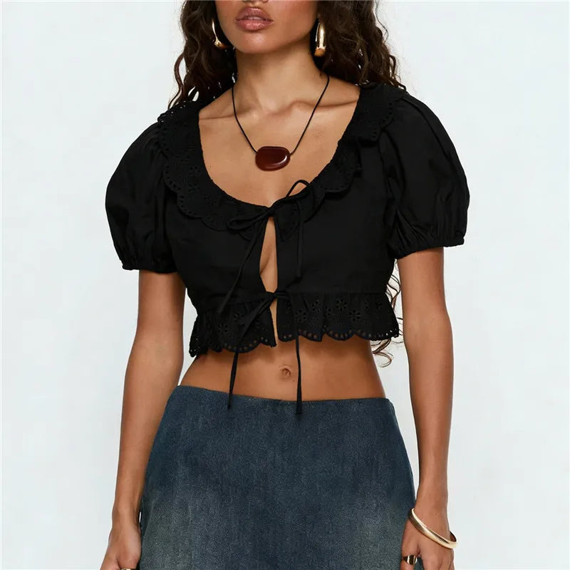 Women's black cotton crop top with scalloped neckline, perfect for summer outings