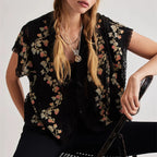 Women's black crop top with floral print, perfect for casual outings
