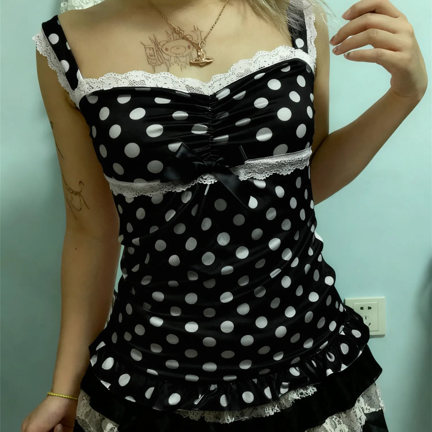 Women's black polka dot crop top, stylish for summer outings