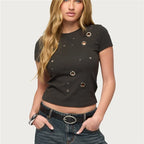 Women's black crop top with embellished grommets, casual wear