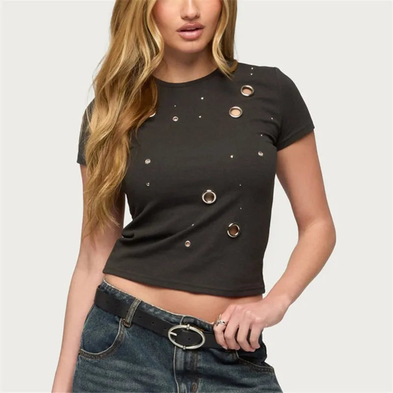 Women's black crop top with embellishments, perfect for casual outings