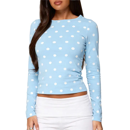 Women's blue polka dot crop top in soft material, perfect for casual outings