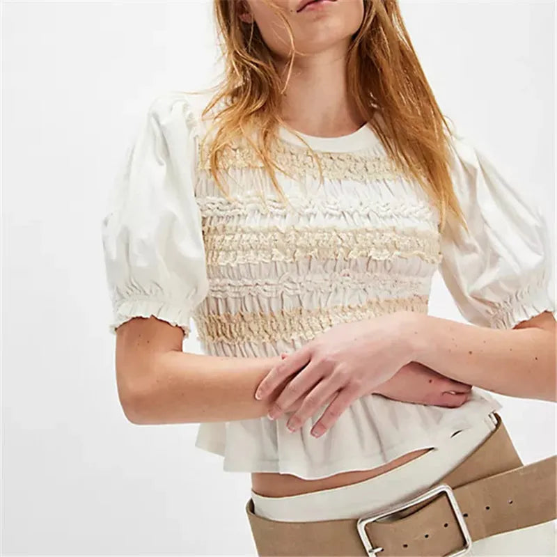 Women's white crop top with puff sleeves, perfect for casual outings