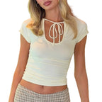 Women's light yellow crop top with tie detail for casual outings