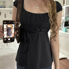 Women's black polka dot crop top, perfect for casual outings