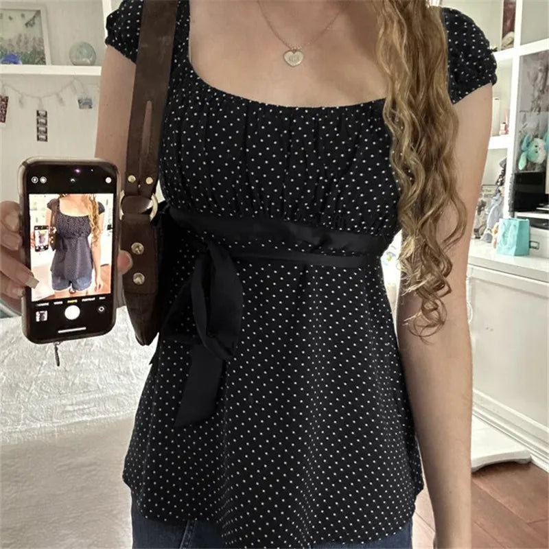 Women's black polka dot crop top, perfect for casual outings