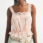 Women's pink lace crop top, soft material, perfect for casual outings