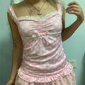 Women's pink polka dot crop top with lace trim for casual wear