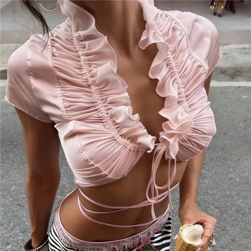 Women's pink crop top with ruffle details for summer outings