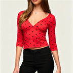 Women's red polka dot crop top in stretchy material for casual outings