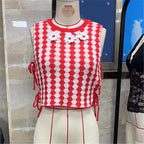 Women's red knitted crop top with floral accents for casual wear