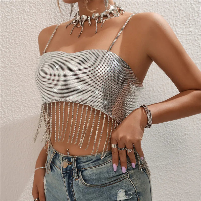 Women's silver rhinestone crop top with fringe, perfect for parties