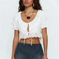 Women's white crop top with puff sleeves and lace detailing