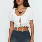 Women's white crop top with puff sleeves and lace detailing